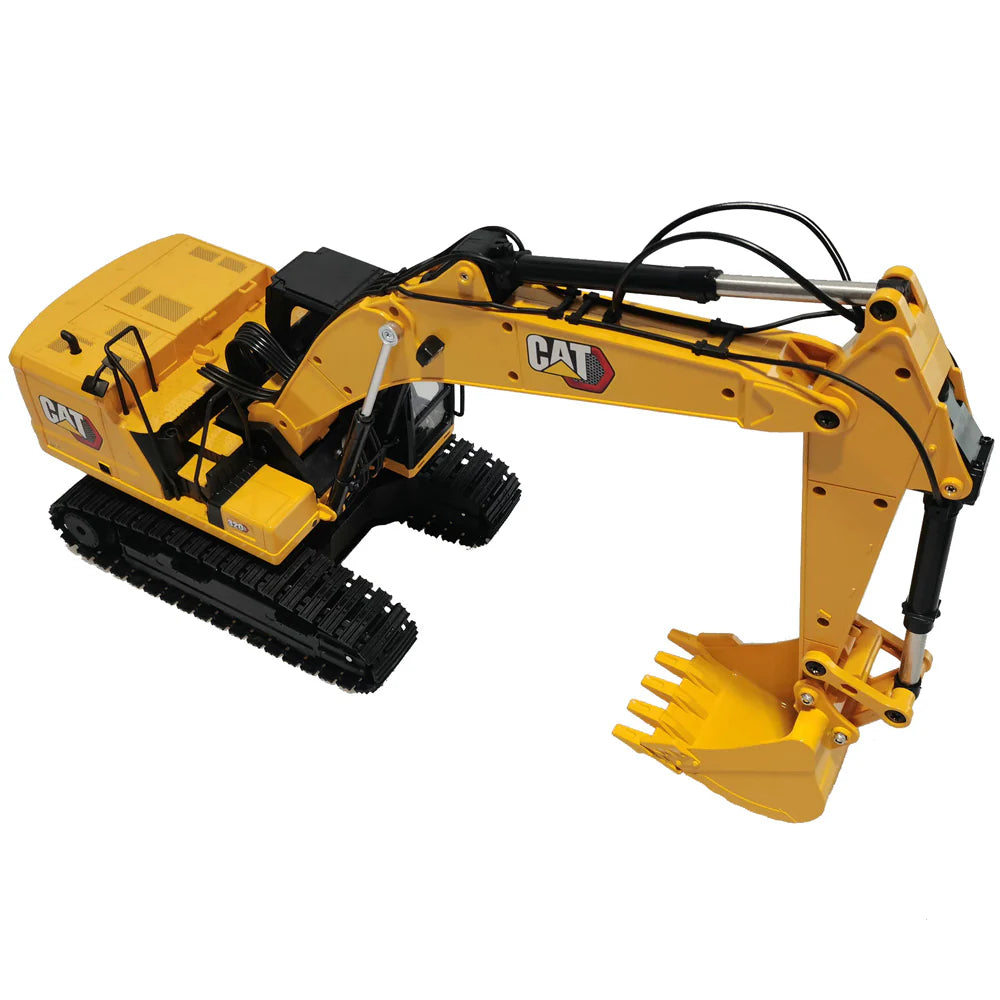 Yellow toy CAT excavator with black tracks