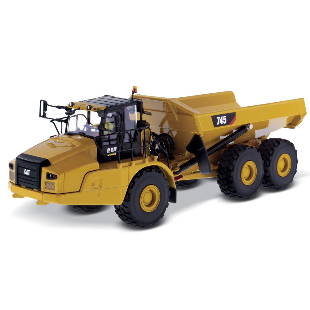 Yellow construction dump truck model on a white background