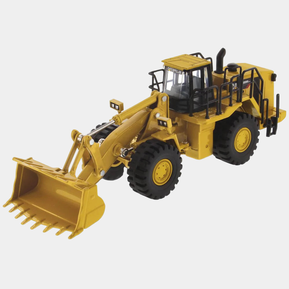 Yellow toy bulldozer on a white background