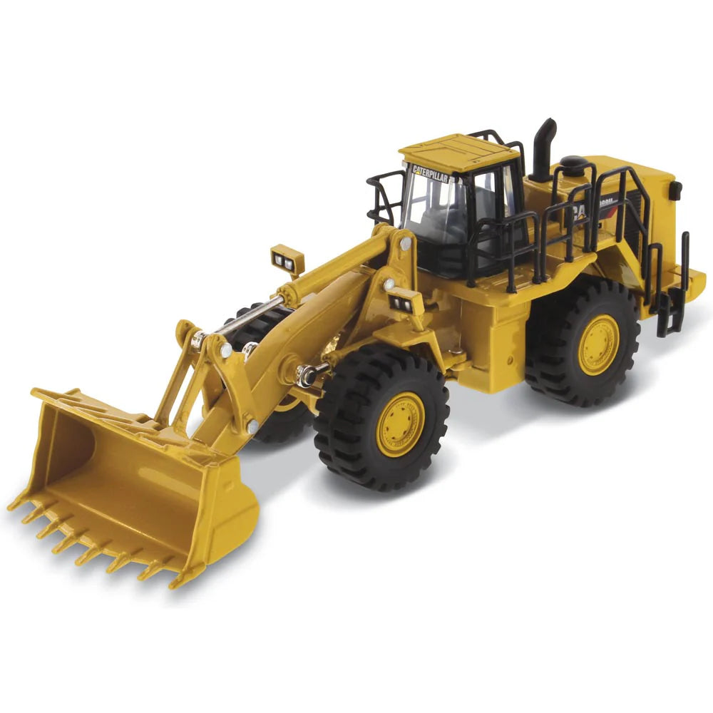 Yellow toy bulldozer on a white background